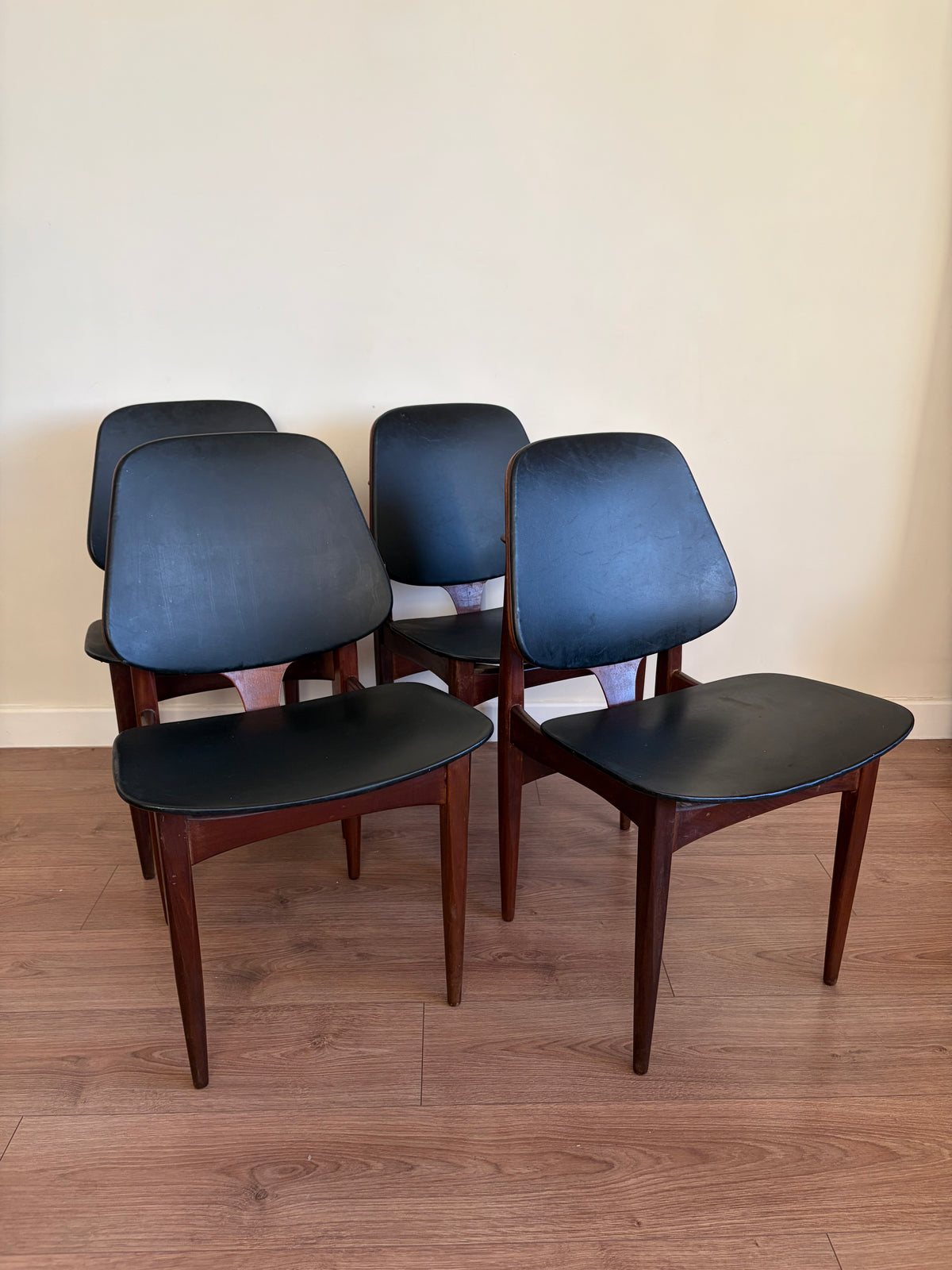 Four Elliots of Newbury Mid Century Modern Black Teak Dining Chairs Refurbished in Excellent Condition