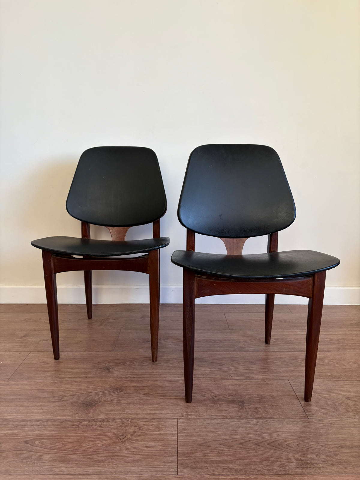 Four Elliots of Newbury Mid Century Modern Black Teak Dining Chairs Refurbished in Excellent Condition
