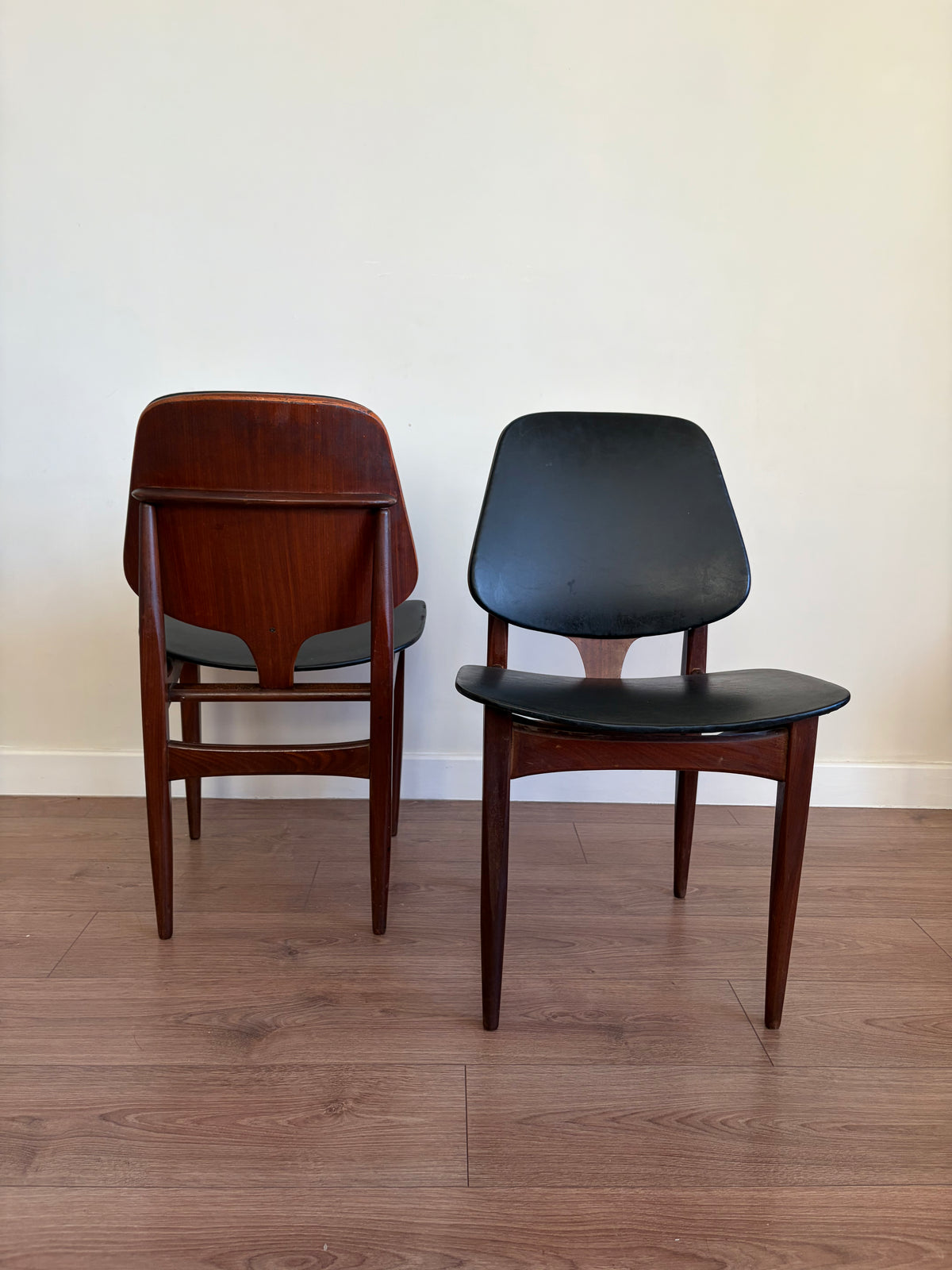 Four Elliots of Newbury Mid Century Modern Black Teak Dining Chairs Refurbished in Excellent Condition