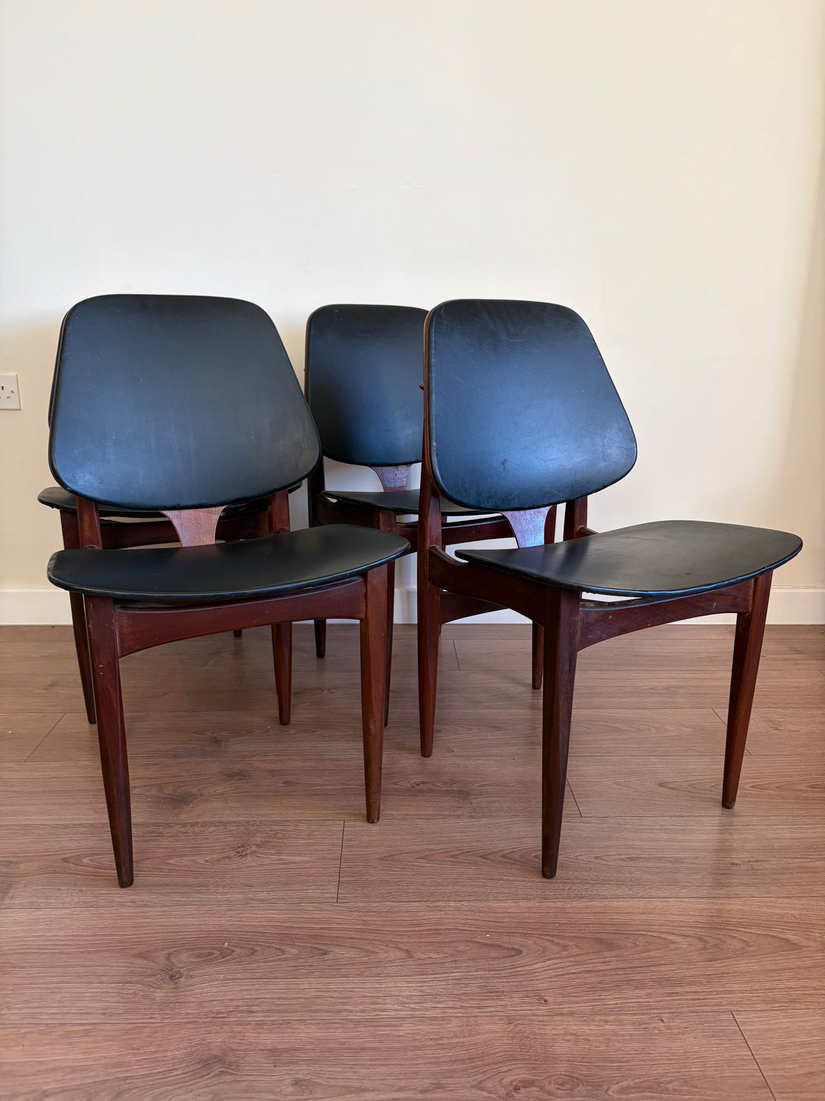 Four Elliots of Newbury Mid Century Modern Black Teak Dining Chairs Refurbished in Excellent Condition