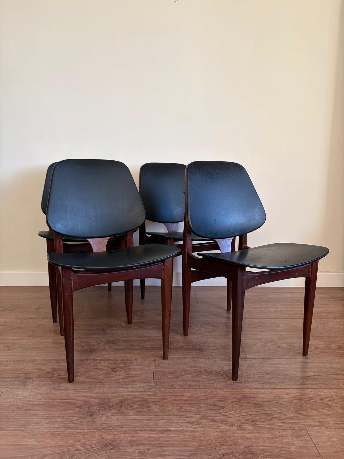 Four Elliots of Newbury Mid Century Modern Black Teak Dining Chairs Refurbished in Excellent Condition