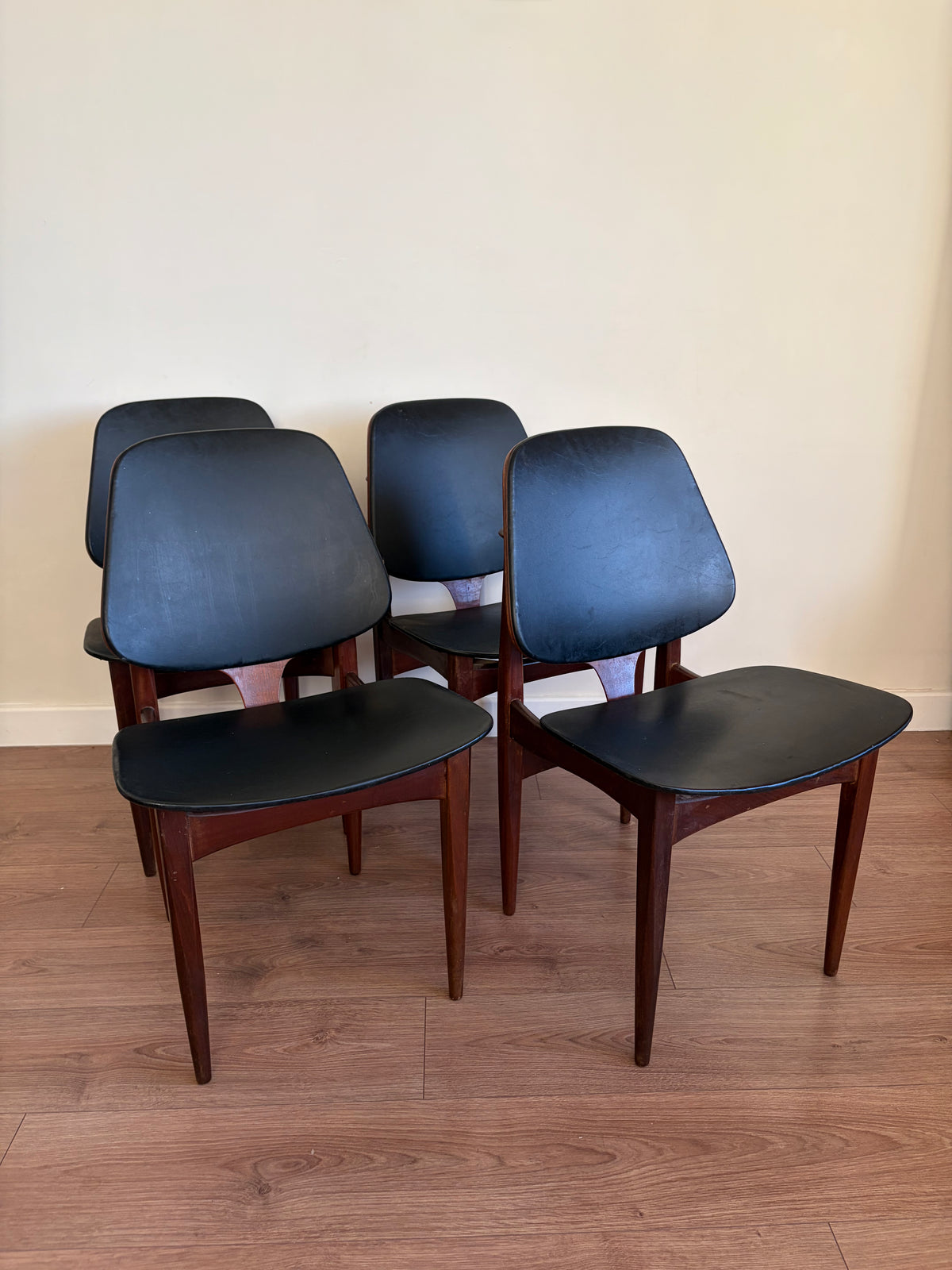 Four Elliots of Newbury Mid Century Modern Black Teak Dining Chairs Refurbished in Excellent Condition