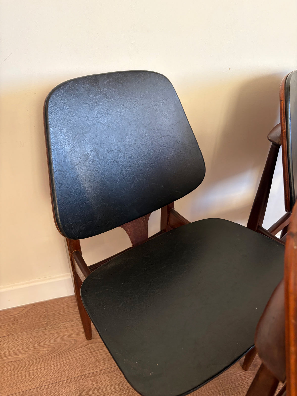 Four Elliots of Newbury Mid Century Modern Black Teak Dining Chairs Refurbished in Excellent Condition