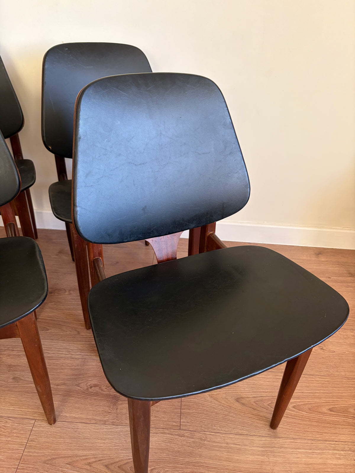 Four Elliots of Newbury Mid Century Modern Black Teak Dining Chairs Refurbished in Excellent Condition
