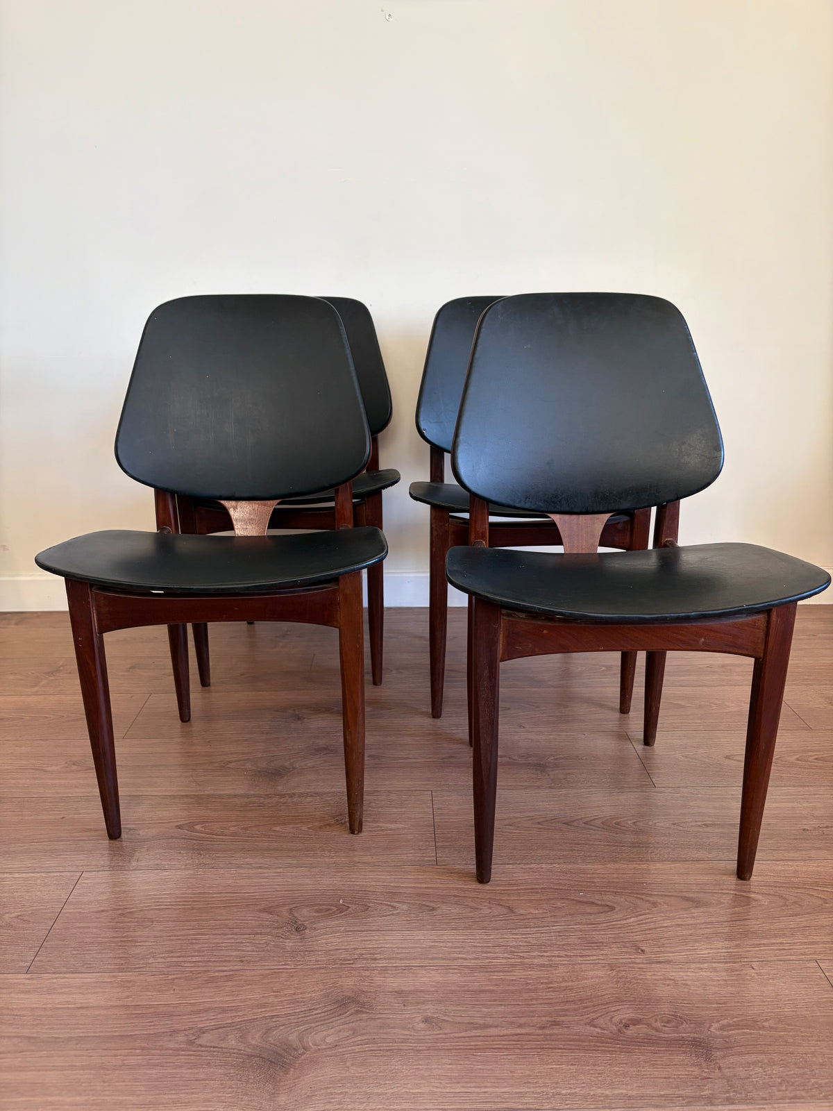Four Elliots of Newbury Mid Century Modern Black Teak Dining Chairs Refurbished in Excellent Condition